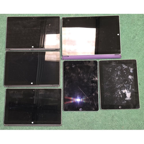 40 - A collection of handheld tablets to include Apple iPads and Microsoft. Six in all. No chargers. Offe... 