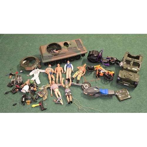 33 - A large collection of Action Man figures, vehicles, clothing and accessories. Includes a couple of e... 