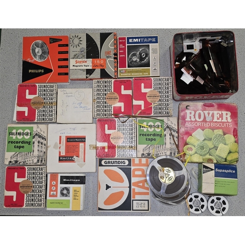 34 - A collection of vintage unchecked recording reel to reel tape together with a tin of vintage photo n... 