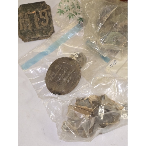 36 - A tin containing a large collection of salvage/metal detecting finds to include some coins. Good lot... 