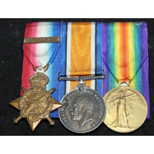 70 - WWI medal trio including 1914 Mons Star with 15th Aug-22nd Nov 1914 clasp, meaning recipient came un... 