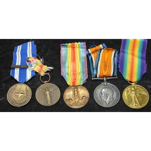 76 - A small collection of military medals to include WWI War and Victory medals (not a pair), Italian an... 