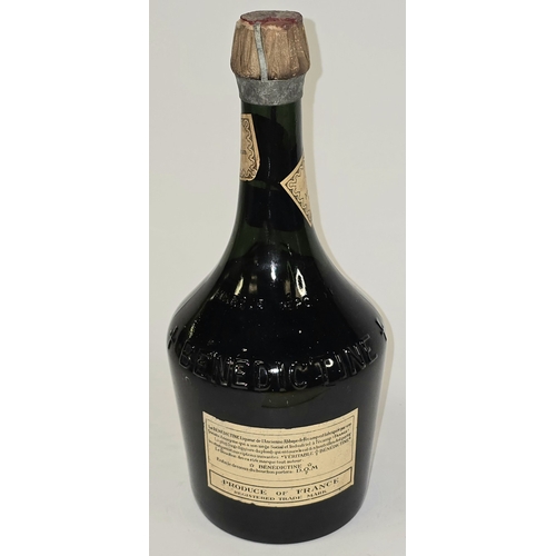 17 - A bottle of vintage 1950's Dom Benedictine. Still sealed although some evaporation has occurred due ... 