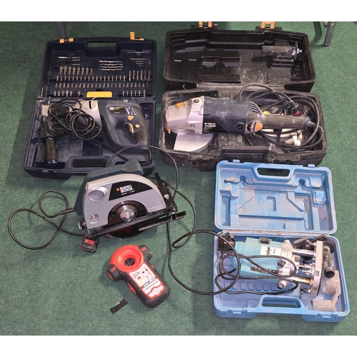 A collection of various corded power tools.