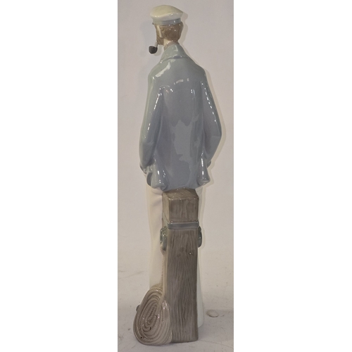 11 - Lladro 4621 Sea Captain Smoking a Pipe figurine. Retired 1970. Comes boxed.