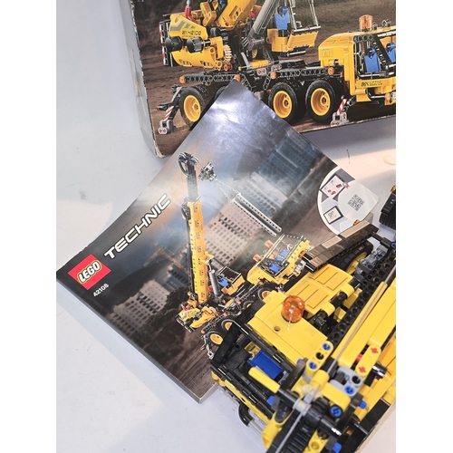 6 - A Lego Technic 42108 Mobile Crane set. Presented in built condition c/w box and instructions.