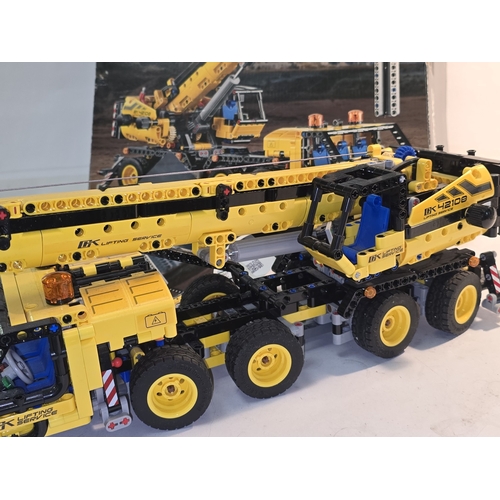 6 - A Lego Technic 42108 Mobile Crane set. Presented in built condition c/w box and instructions.