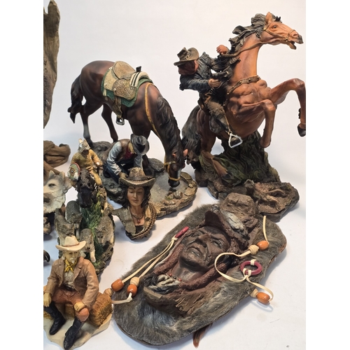 154 - A collection of modern resin Cowboy and Indian figurines.