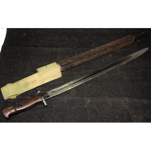140 - WWI era 1907 Pattern sword bayonet c/w webbing frog and scabbard. Good foundry/armoury stamps. Sold ... 