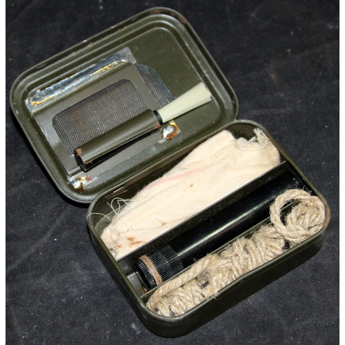 142 - WWII British Army Lee Enfield rifle cleaning kit tin c/w contents