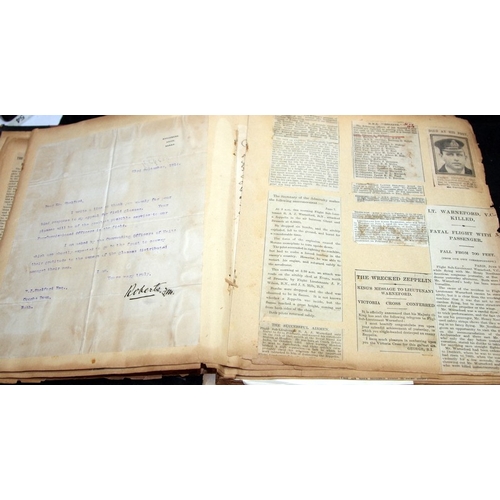 143 - Interesting WWI scrapbook containing newspaper cuttings featuring news stories, obituaries, medal ci... 