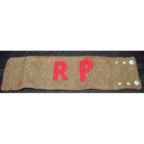 146 - WWII era woolen khaki RP arm band. 1941 Gun drill for 25-PR Mk II gun pocket book, c/w fold out draw... 