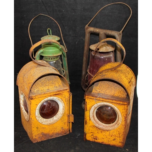 165 - Two vintage Tilley lamps, one with red glass c/w two vintage steel yellow road lamps.