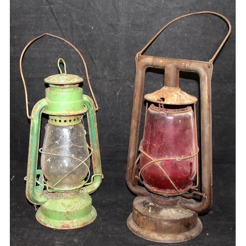 165 - Two vintage Tilley lamps, one with red glass c/w two vintage steel yellow road lamps.