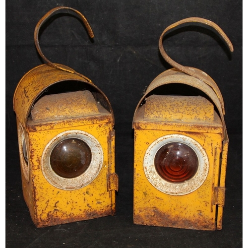 165 - Two vintage Tilley lamps, one with red glass c/w two vintage steel yellow road lamps.