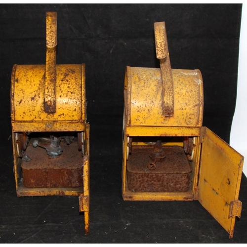 165 - Two vintage Tilley lamps, one with red glass c/w two vintage steel yellow road lamps.