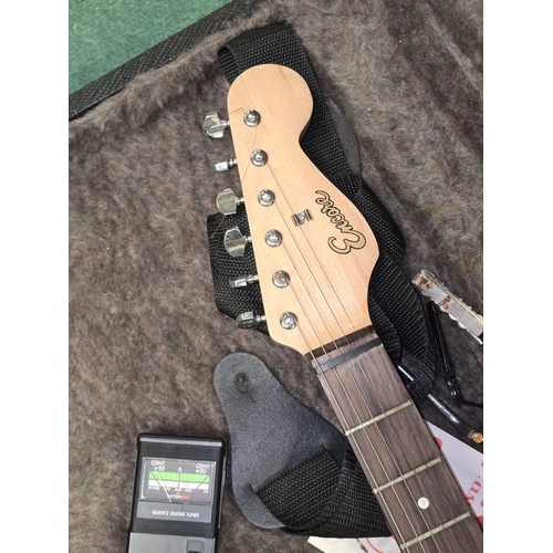 53 - An Encore red Stratocaster style six string electric guitar c/w hard carry case and quartz guitar tu... 