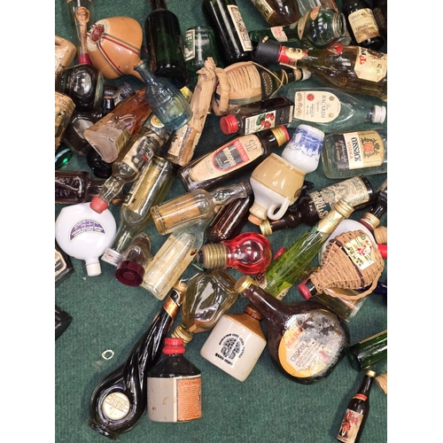 6 - A large quantity of vintage alcohol miniatures. Unchecked for fill levels.