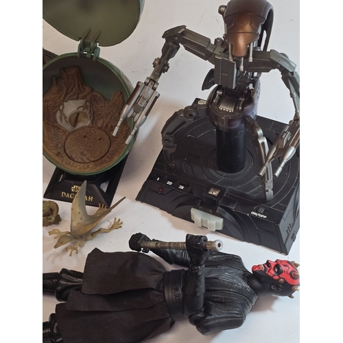 38 - A collection of various Star Wars toys mostly from the 1990's.