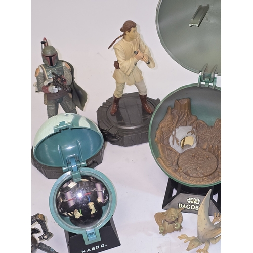 38 - A collection of various Star Wars toys mostly from the 1990's.