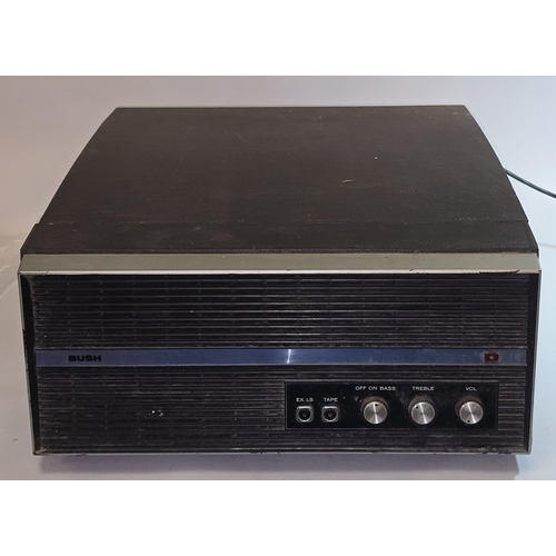 46 - A vintage 1960s Bush RP60 portable record player. Powers on and turntable spins. Amplifier working b... 