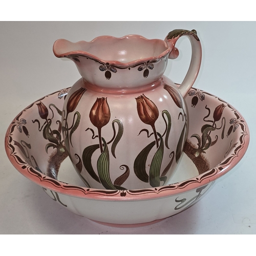 20 - An early 20th century wash bowl and jug set in floral relief 