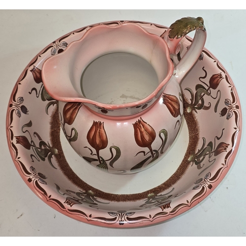 20 - An early 20th century wash bowl and jug set in floral relief 