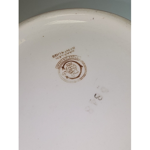 20 - An early 20th century wash bowl and jug set in floral relief 