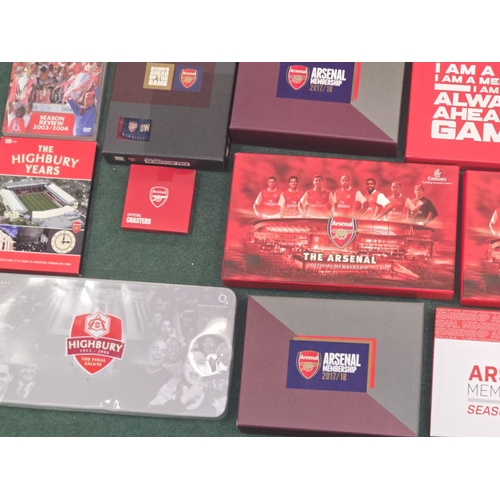 58 - A large collection of Arsenal FC memorabilia to include membership packs, DVD's, Matchday Programmes... 