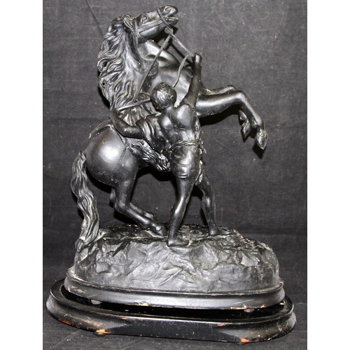 23 - After Guillaume Coustou, large cast metal sculpture 'The Horse Tamer' on wooden base. O/all 48cms ta... 