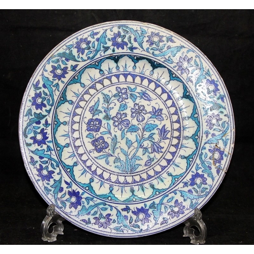 28 - Antique Ottoman Empire Iznik pottery 31cms plate with blue and turquoise decoration. A/f for resrora... 