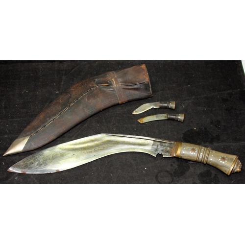 31 - Vintage Nepalese Kukri with lions head finial in leather sheath c/w associated Karda and Chakmak