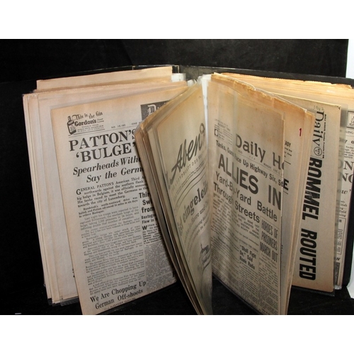 41 - A collection of WWII ephemera to include a file of 1944/1945 newspapers and items relating wireless ... 