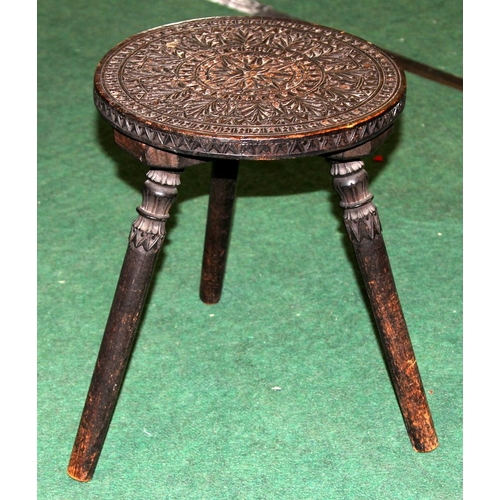 50 - Antique Anglo-Indian tripod stool with turned splayed feet and carved seat. Seat height 36cms