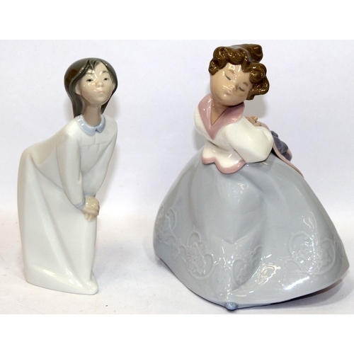 15 - A collection of 1 Lladro and 6 Nao figures of young girls, the largest being 29cms tall