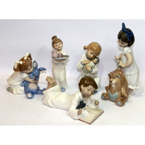 7 - A collection of Nao figures featuring children before bedtime. 5 in lot