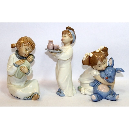 7 - A collection of Nao figures featuring children before bedtime. 5 in lot