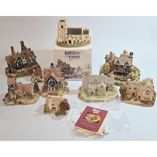 41 - A collection of mostly unboxed Lilliput Lane models to include some paperwork/deeds. Nine models in ... 