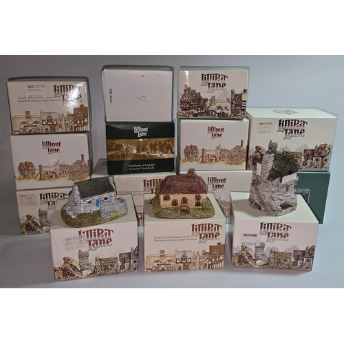 43 - A collection of boxed Lilliput Lane models. Fourteen models in all.