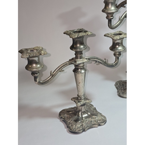 5 - A collection of vintage British Silver Plated candelabras to include a pair of three arm examples an... 