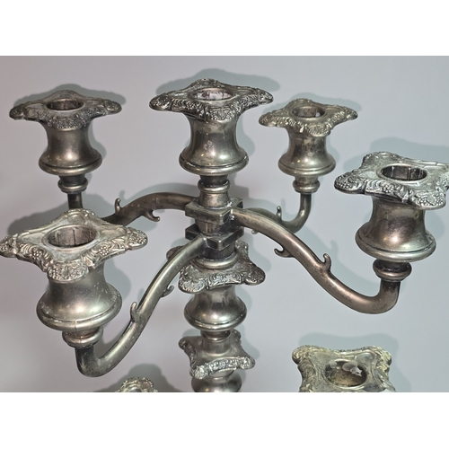5 - A collection of vintage British Silver Plated candelabras to include a pair of three arm examples an... 