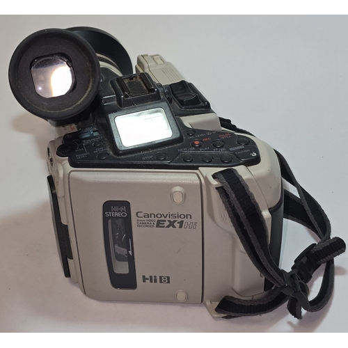 17 - A vintage Canon Canovision EX1 Hi8 8mm Video Camera with attached 5-15mm Zoom lens together with sep... 