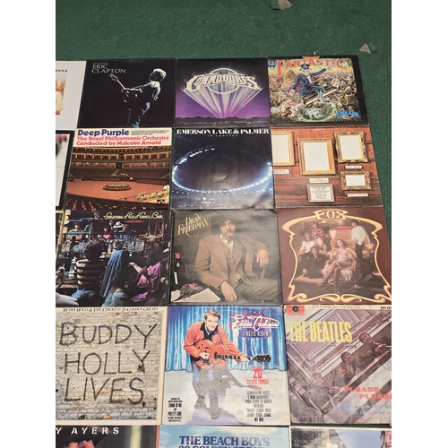 53 - A collection of Pop/Rock/Prog vinyl LP records to include Camel, The Rolling Stones, The Beatles etc... 