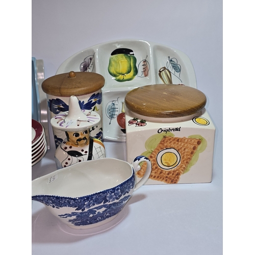 55 - A collection of vintage pottery items to include Poole Pottery Twintone hors d'oeuvres dish and a vi... 