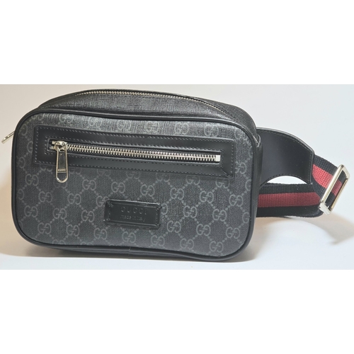 18 - A Gucci belt bag in used condition.