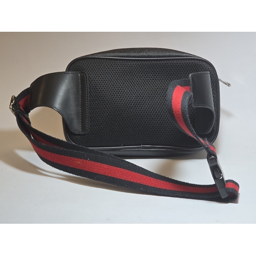 18 - A Gucci belt bag in used condition.