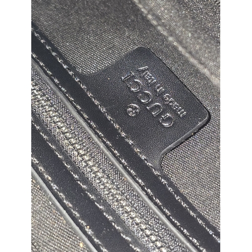 18 - A Gucci belt bag in used condition.