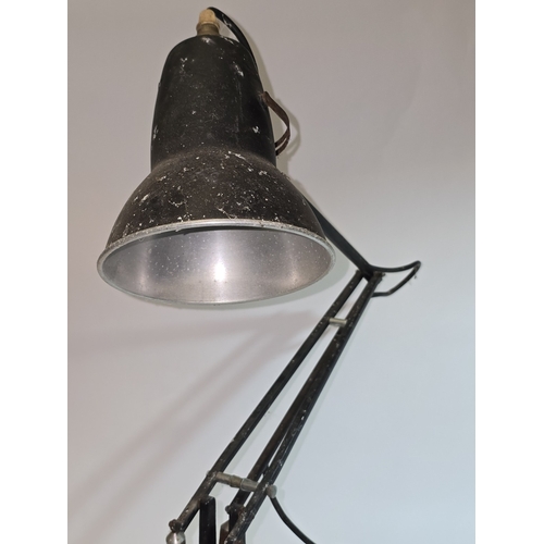 21 - A vintage Herbert Terry & Sons black Anglepoise adjustable desk lamp on stepped base. Offered untest... 