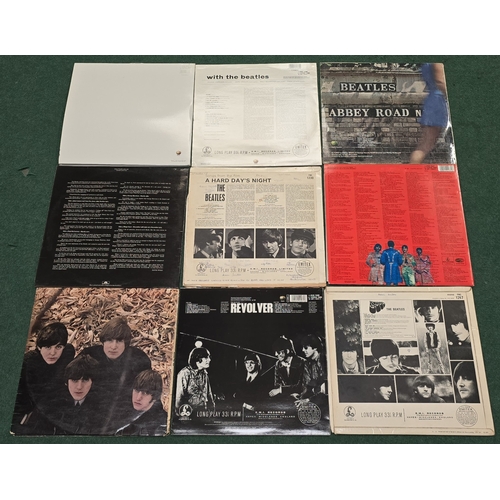 58 - A collection of The Beatles vinyl LP records to include Sgt Pepper's, Revolver, Rubber Soul etc. Som... 