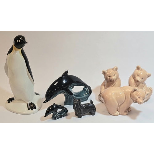 24 - Poole Pottery collection of animals to include three bears, penguin, miniature dolphin, blue Scottie... 